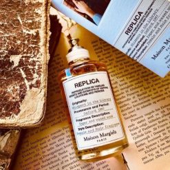 thiet ke replica whispers in the library edt review